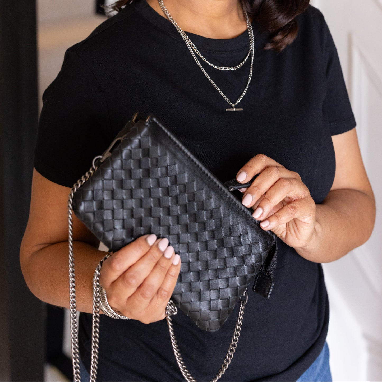 Noemi Leather Woven Clutch Purse